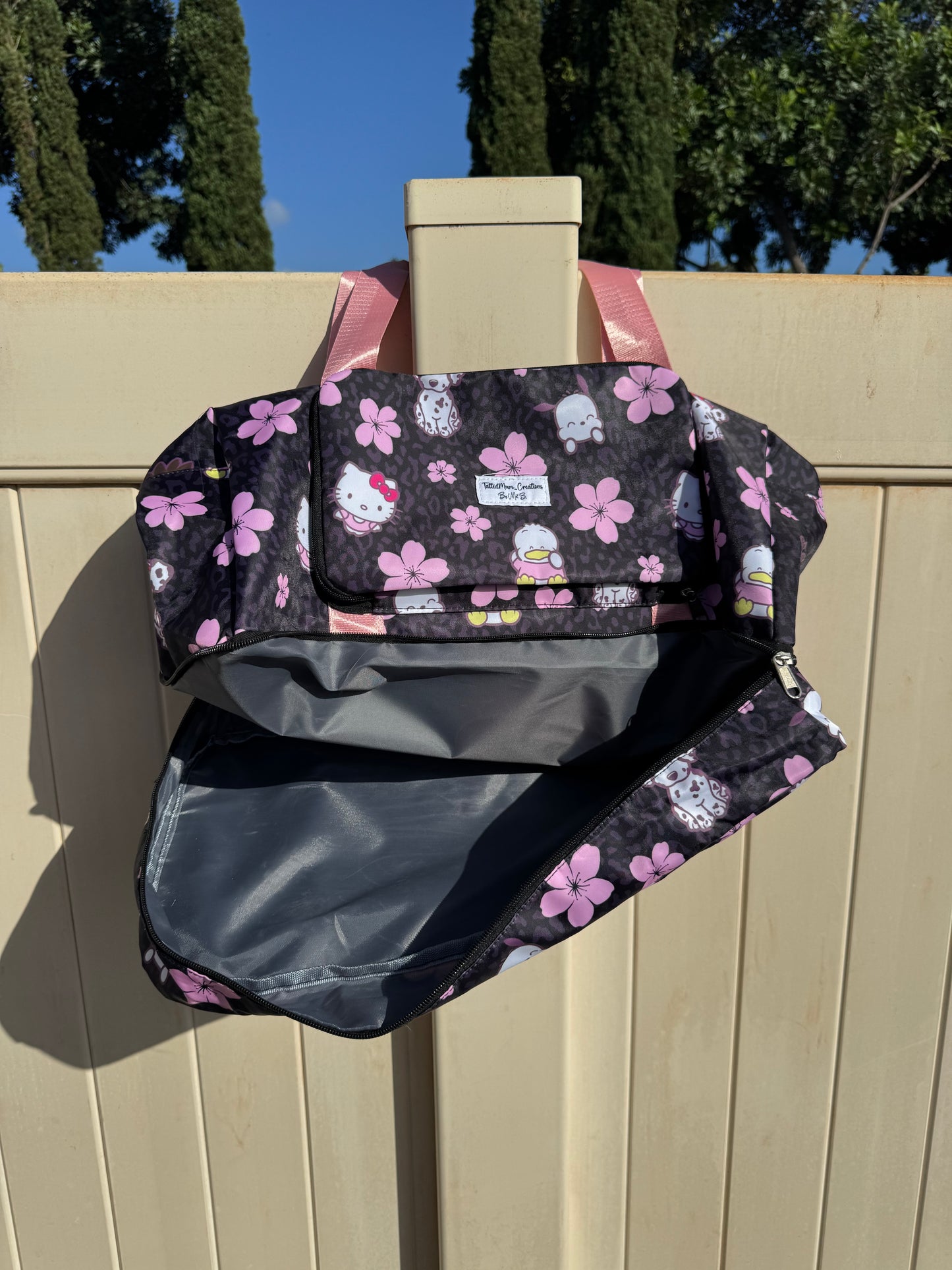 Black Sanrio Duffle Bags
